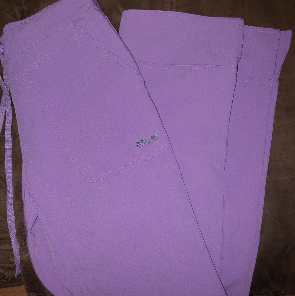 Small, purple, scrubs, greys anatomy